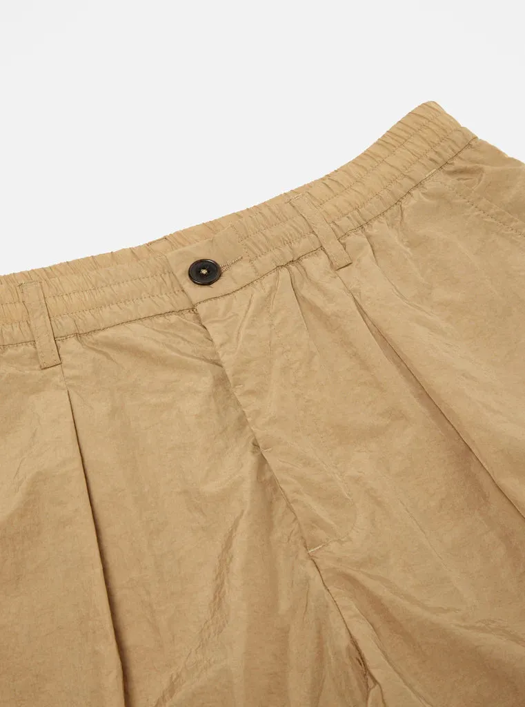 UNIVERSAL WORKS Pleated Track Short In Sand Recycled Nylon Tech