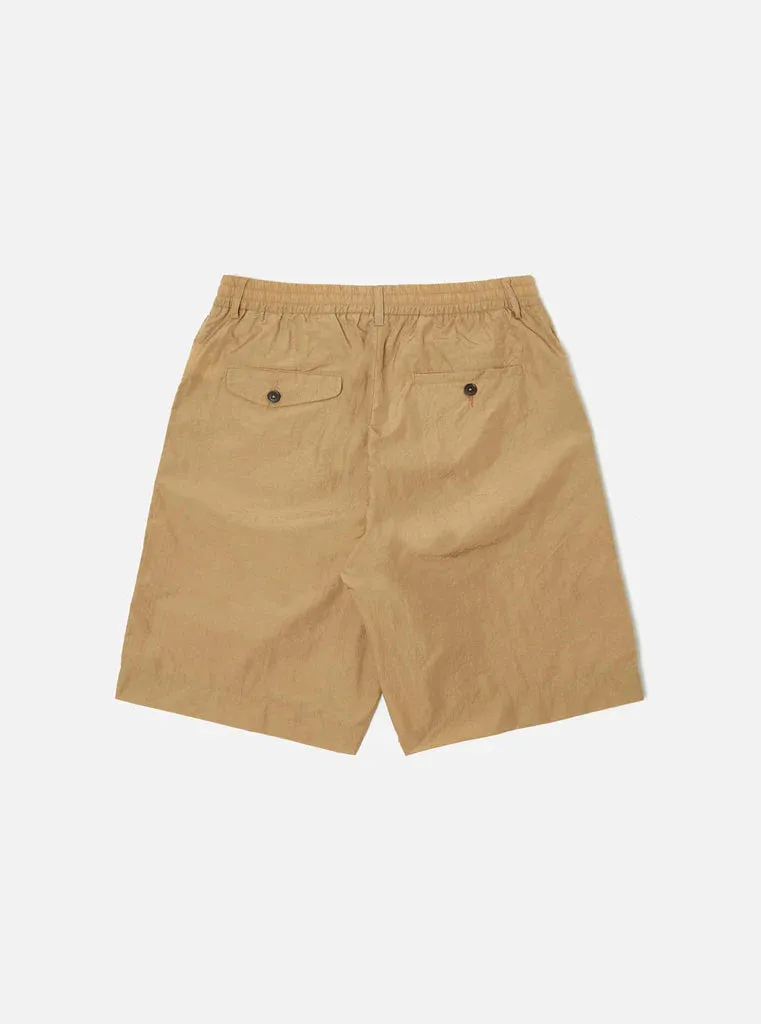 UNIVERSAL WORKS Pleated Track Short In Sand Recycled Nylon Tech